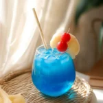 How to Make a Blue Hawaiian Cocktail: Easy Recipe & Tips 6 Blue Hawaiian Drink Garnished