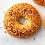 Recipe card visual of cottage cheese bagels with ingredients