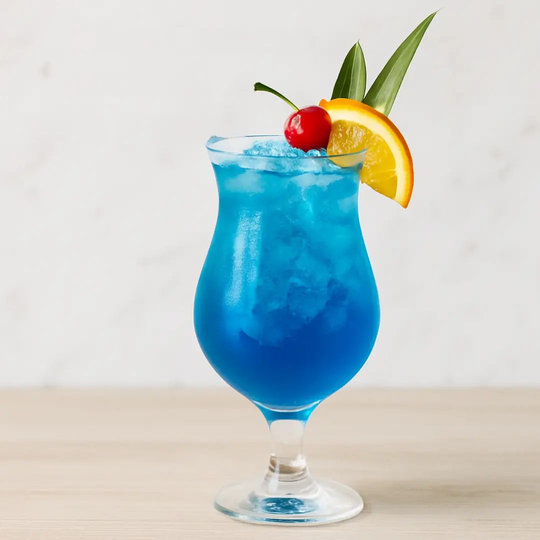 How to Make Curacao at Home - Homemade blue curacao cocktail with orange and cherry garnish -