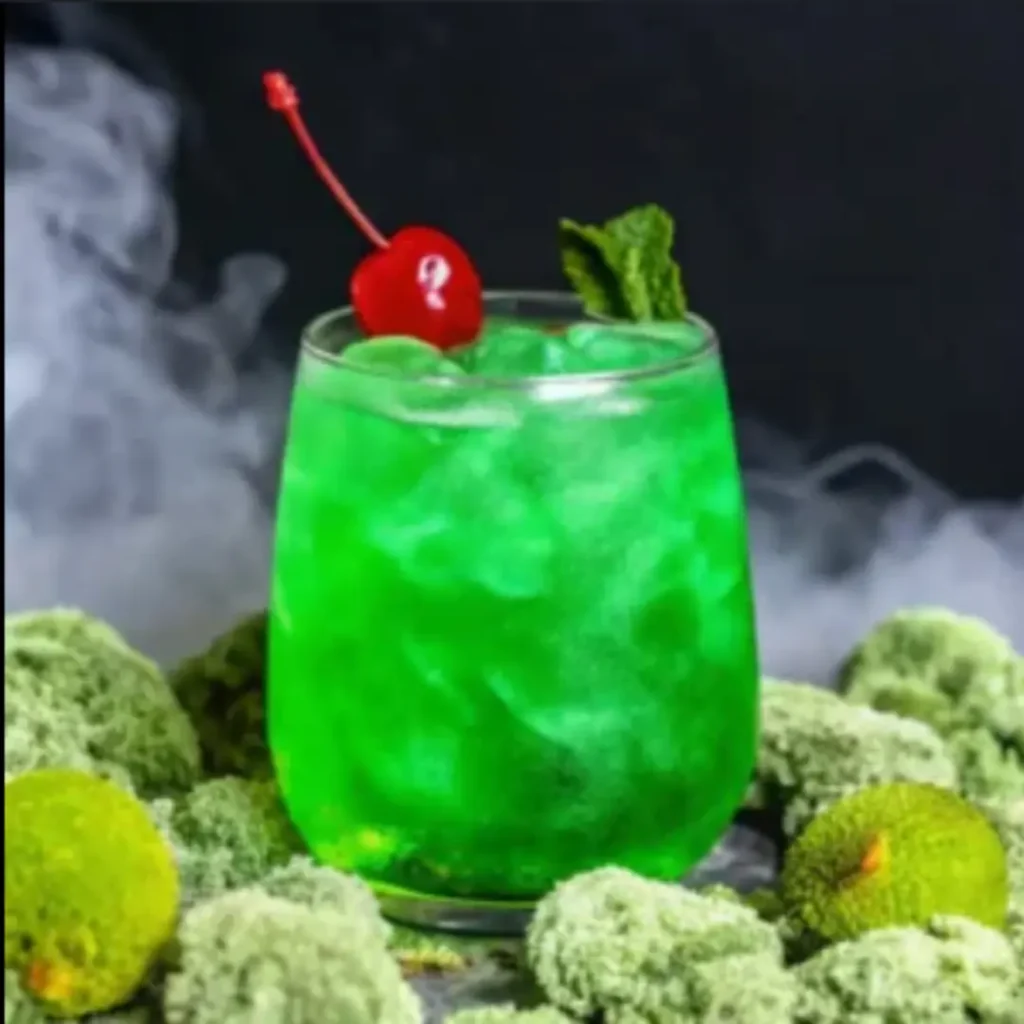 How to Make a Liquid Marijuana Cocktail: Tropical Recipe Everyone Loves! liquid marijuana cocktail Close-up of a Liquid Marijuana cocktail with cherry and mint garnish