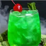 How to Make a Liquid Marijuana Cocktail: Tropical Recipe Everyone Loves! liquid marijuana cocktail Liquid Marijuana cocktail surrounded by mist and garnished with cherry and mint