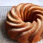 Moist Fall Bundt Cake with glaze and pecan streusel