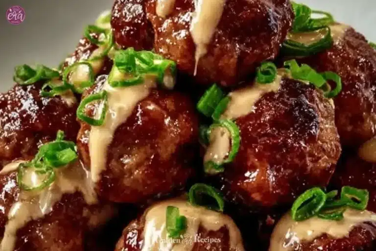 Korean BBQ Meatballs: Sweet, Spicy, and Irresistible 7 Delicious Korean BBQ meatballs garnished with green onions and sesame seeds.