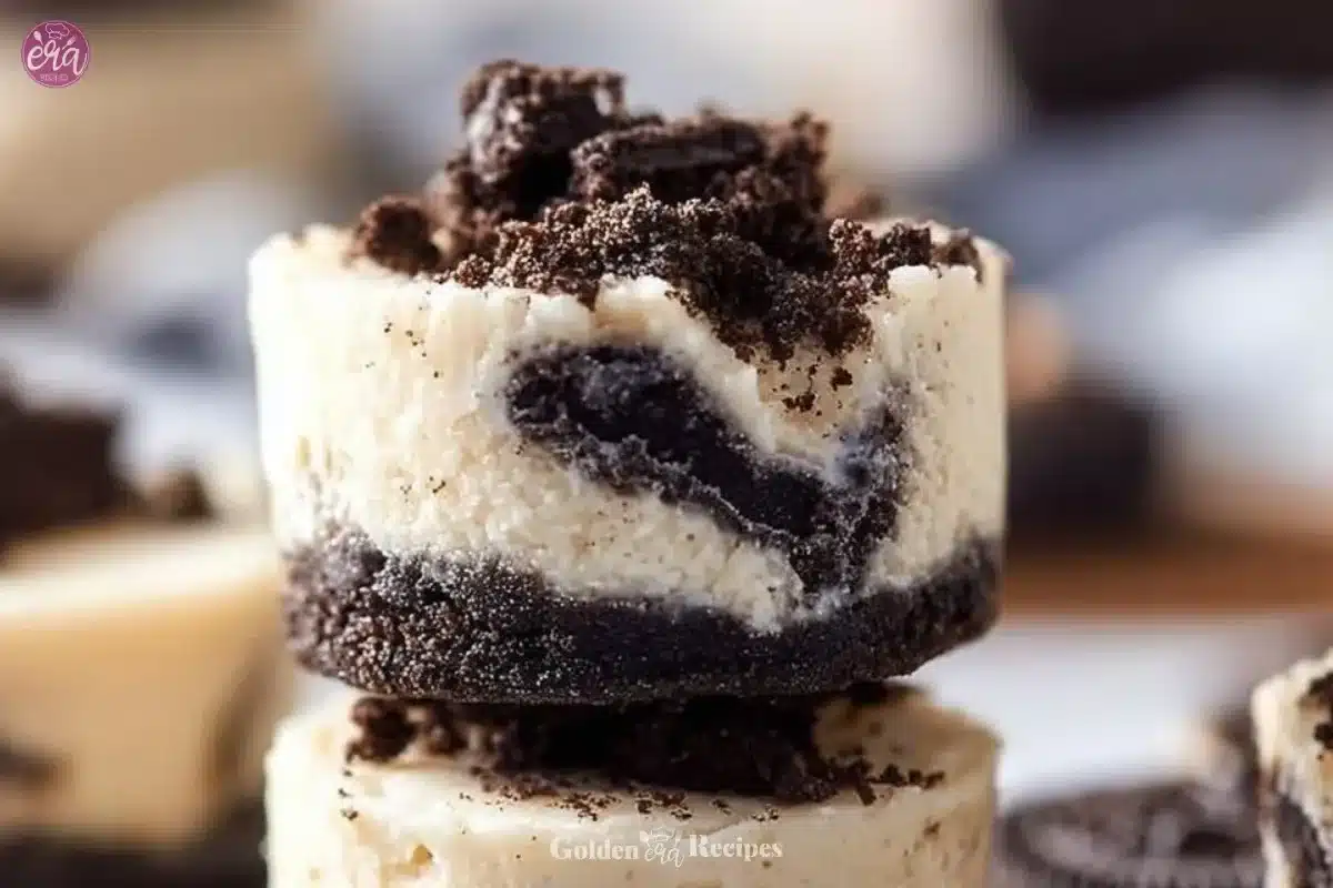 Oreo Cheesecake Bites topped with crushed Oreos and served on a platter
