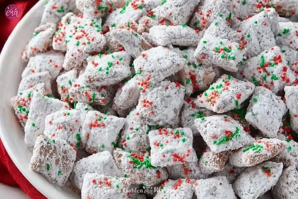 Delicious Christmas Puppy Chow snack mix in a festive bowl