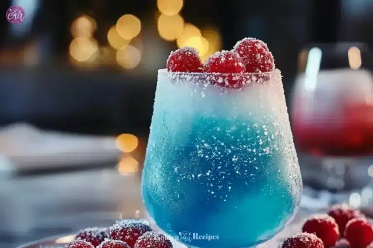 Jack Frost Mocktail in a glass with frosty decorations