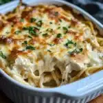 Delicious easy chicken tetrazzini casserole topped with herbs and cheese