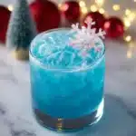 Refreshing Polar Bear Cocktail served in a chilled glass with ice and citrus garnishes.