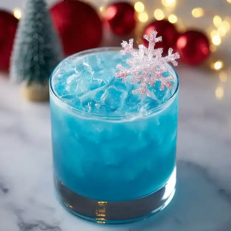 Refreshing Polar Bear Cocktail served in a chilled glass with ice and citrus garnishes.