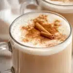 Delicious Vanilla Chai Latte with spices and cream served in a cup