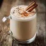 Delicious Vanilla Chai Tea Latte topped with frothy milk and spices.
