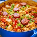 A colorful bowl of easy one pot jambalaya with rice and seafood.