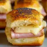 Ham and Havarti Cheese Sliders on a wooden platter
