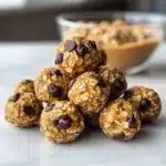 No-bake peanut butter energy bites with oats and chocolate chips.