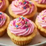 Delicious homemade sugar cookie cups filled with frosting and sprinkles