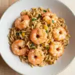 Lemony shrimp orzo dish with fresh herbs and vibrant flavors
