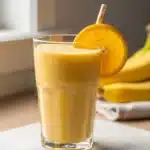 Creamy orange banana smoothie ready in minutes for a refreshing drink
