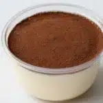 Viral gluten-free tiramisu chia pudding topped with cocoa and coffee.