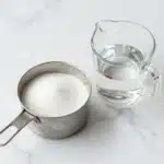 Homemade simple syrup in a glass jar with soft glow effect