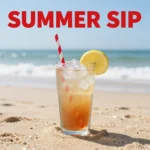 A beautifully served Long Island Iced Tea in a cocktail glass with lemon slices.