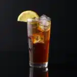 A refreshing Long Island Iced Tea Velvet cocktail served in a glass with garnishes.