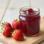 No-waste strawberry top simple syrup made from fresh strawberries.