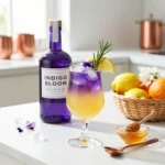Tropical Bees Knees Softly Nurtured drink highlighting refreshing tropical flavors.