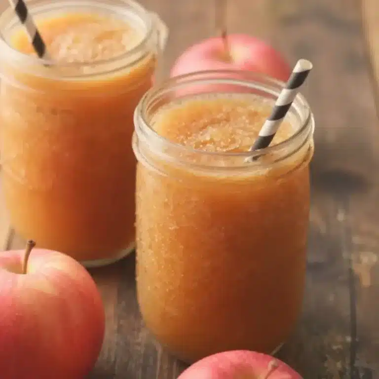 Refreshing Apple Cider Slushie Eternal Glow served in a clear glass with ice.
