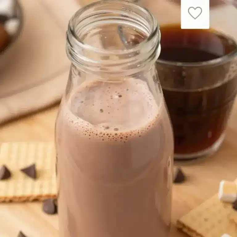 Delicious S'mores Coffee Creamer in a cup with chocolate and marshmallows