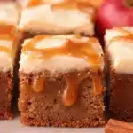 Delicious homemade apple cider cake with a drizzle of glaze.