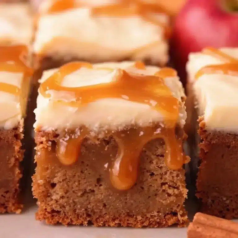 Delicious homemade apple cider cake with a drizzle of glaze.