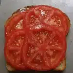 Delicious homemade tomato sandwich on whole grain bread